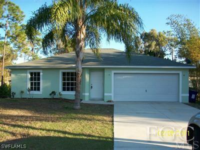 8136 Anhinga Road Fort Myers, FL 33967 - Photo 1 of 6 a view of a house with a yard