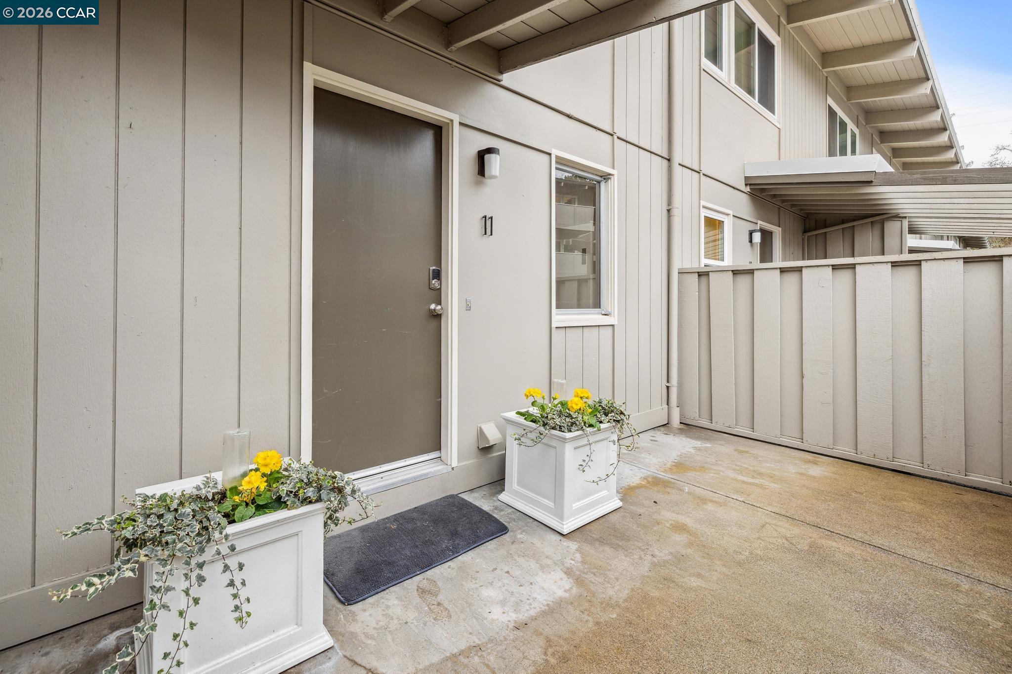 73 Brookwood Road, Unit 11 Orinda, CA 94563 - Photo 1 of 11 a front view of a house