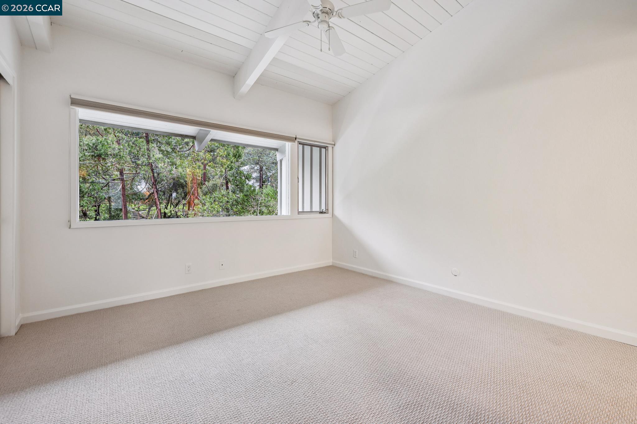 73 Brookwood Road, Unit 11 Orinda, CA 94563 - Photo 6 of 11 an empty room with a window