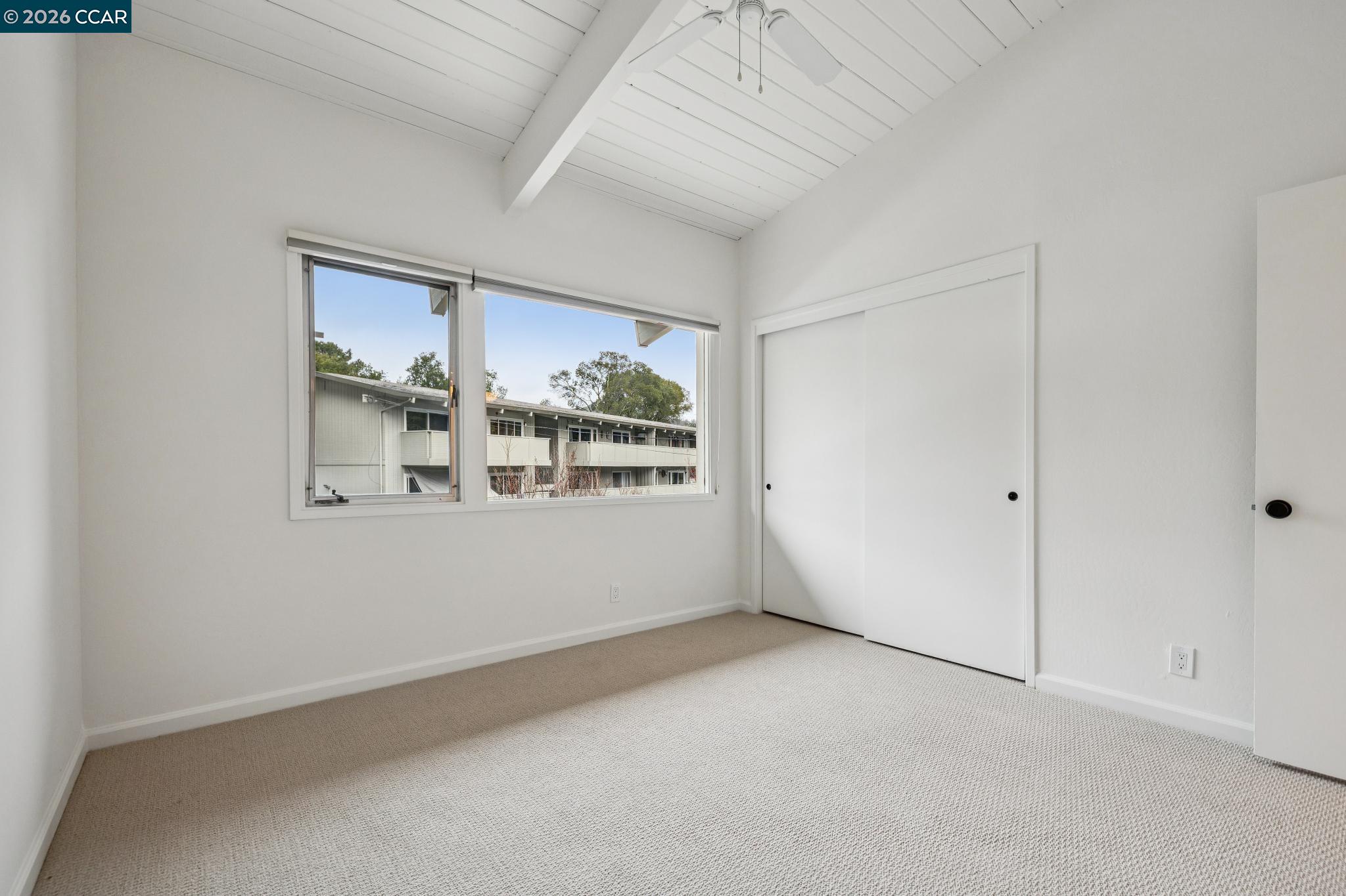 73 Brookwood Road, Unit 11 Orinda, CA 94563 - Photo 9 of 11 an empty room with windows