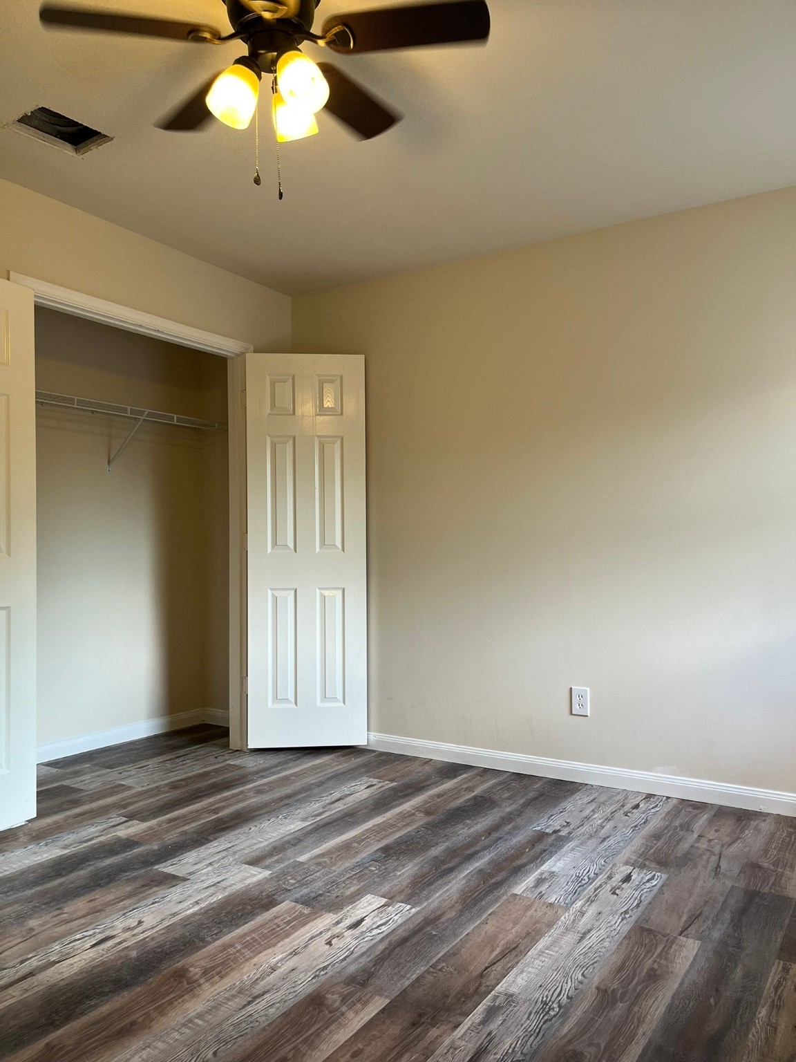21650 Falvel Sunset Court Spring, TX 77388 - Photo 29 of 35 a view of an empty room and chandelier fan