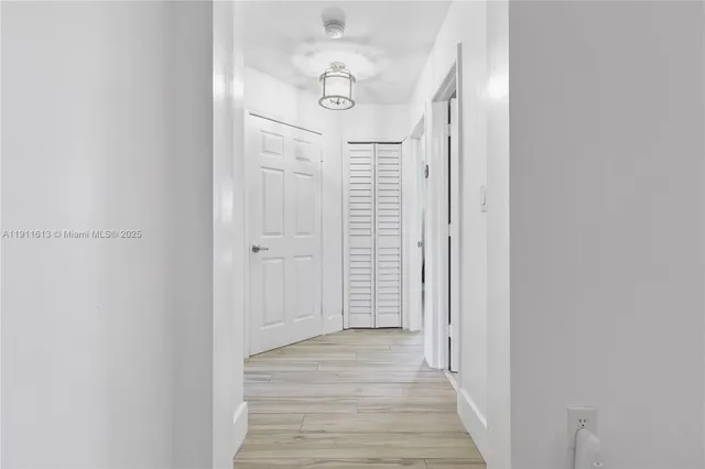 a bedroom with bed and window