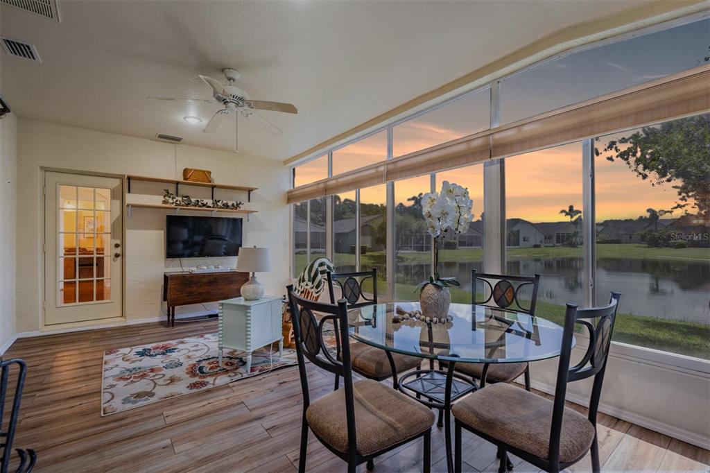1042 Dustan Place Trinity, FL 34655 - Photo 2 of 48 a view of a dining room with furniture window and outside view