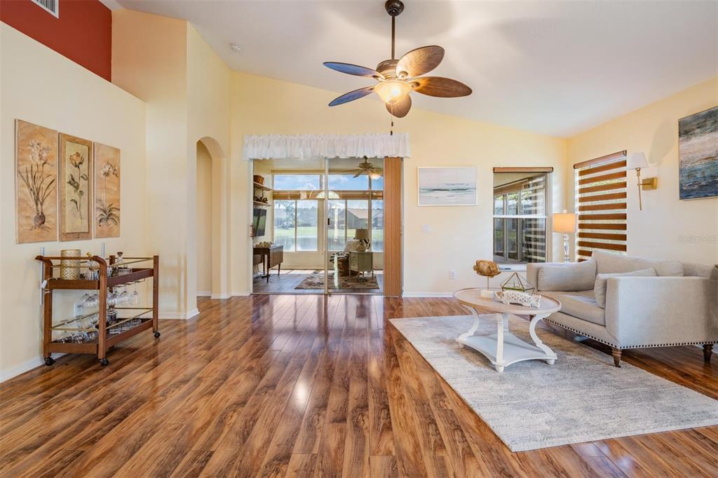 1042 Dustan Place Trinity, FL 34655 - Photo 4 of 48 a living room with furniture and a large window