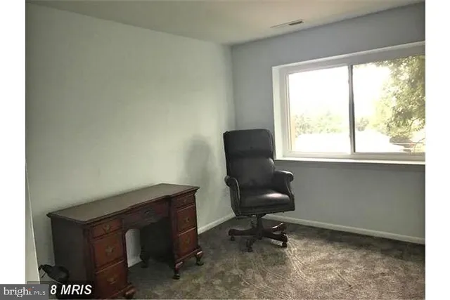 a view of workspace with a window