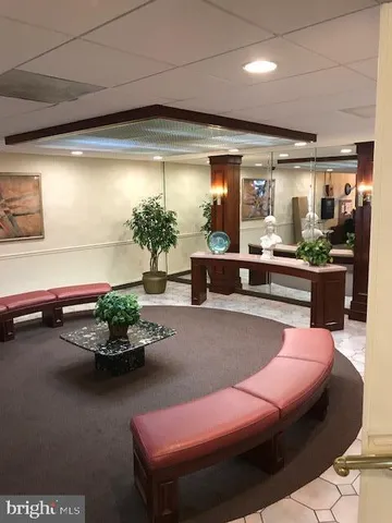 a room with furniture and a chandelier