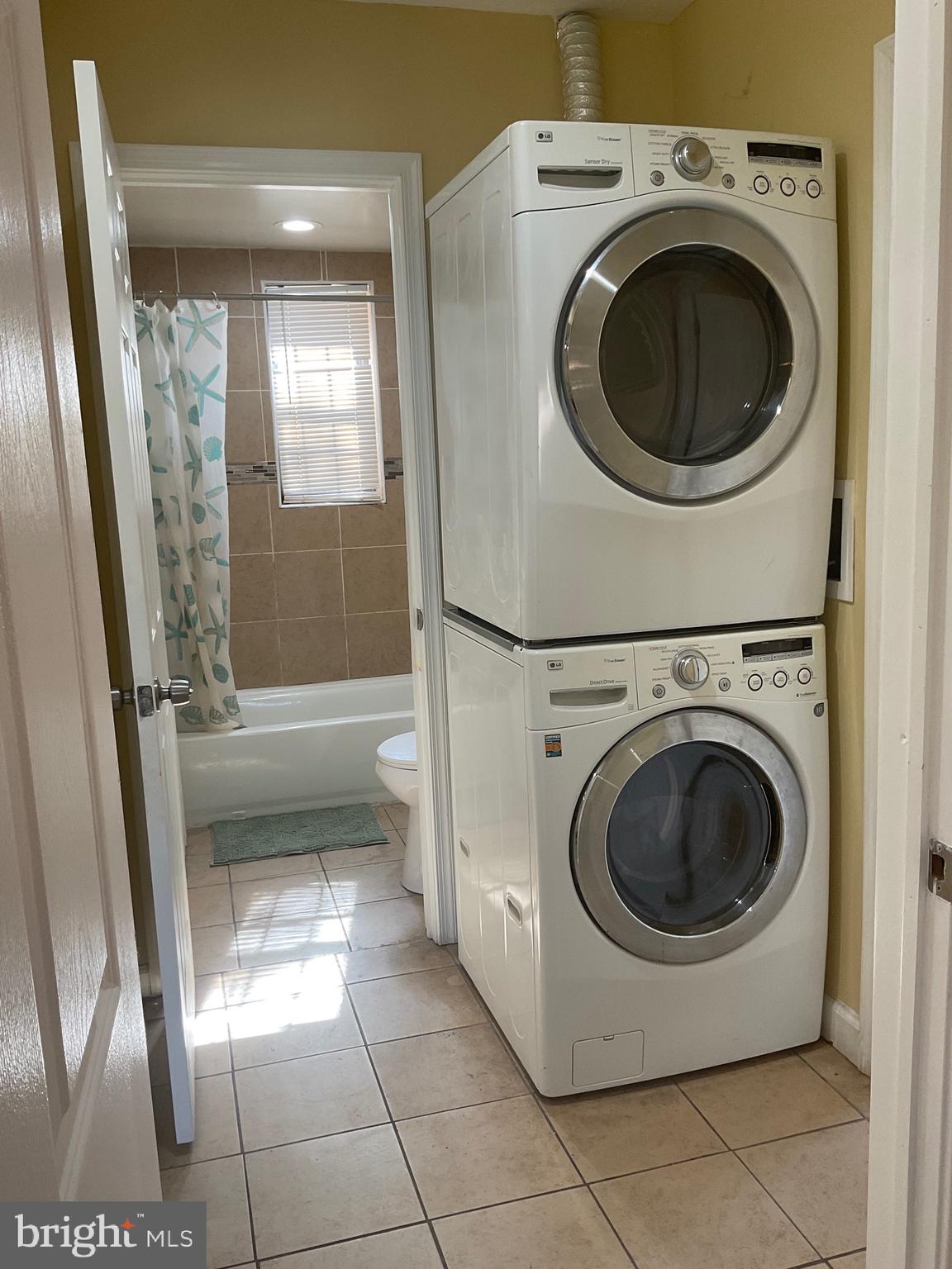 6 Galveston Street Southwest, Unit 103 Washington, DC 20032 - Photo 13 of 17 a utility room with dryer and washer