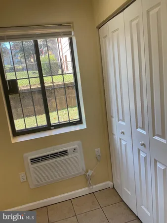 a kitchen with a sink stove and refrigerator