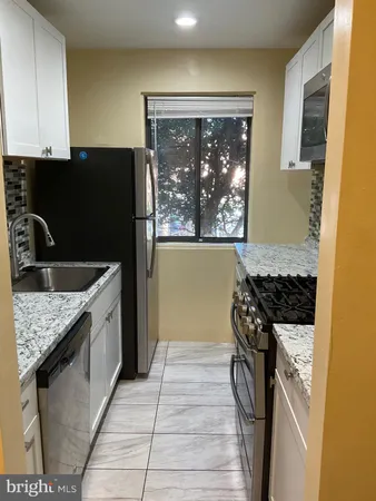 a view of a storage & utility room with washer and dryer