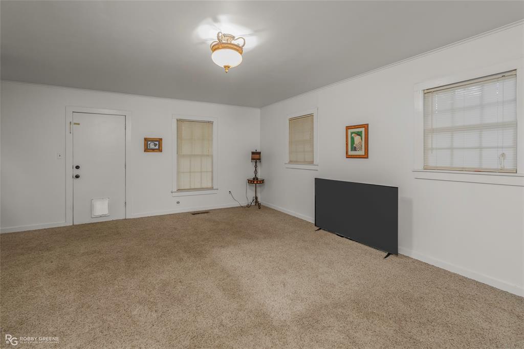 515 Davis Street Minden, LA 71055 - Photo 18 of 28 a view of empty room with windows