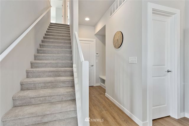 a bedroom with a bed and a table