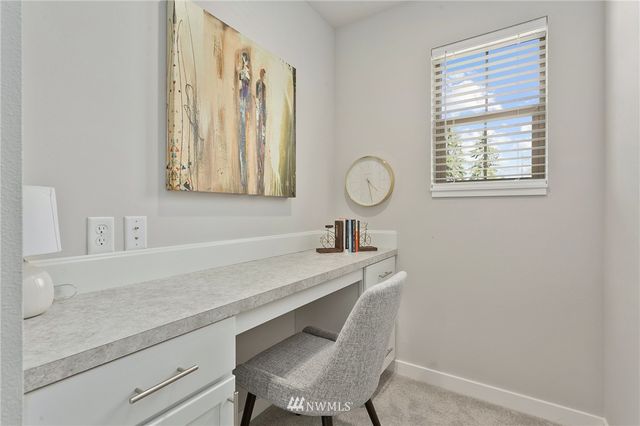 a front view of a house with a yard and porch