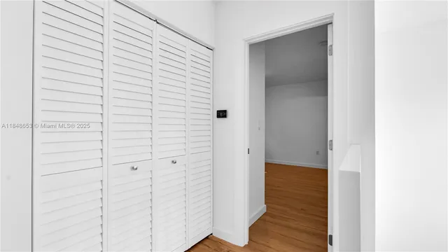 a bathroom with a shower and a toilet