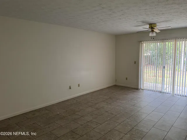 a kitchen with a cabinets and a stove top oven