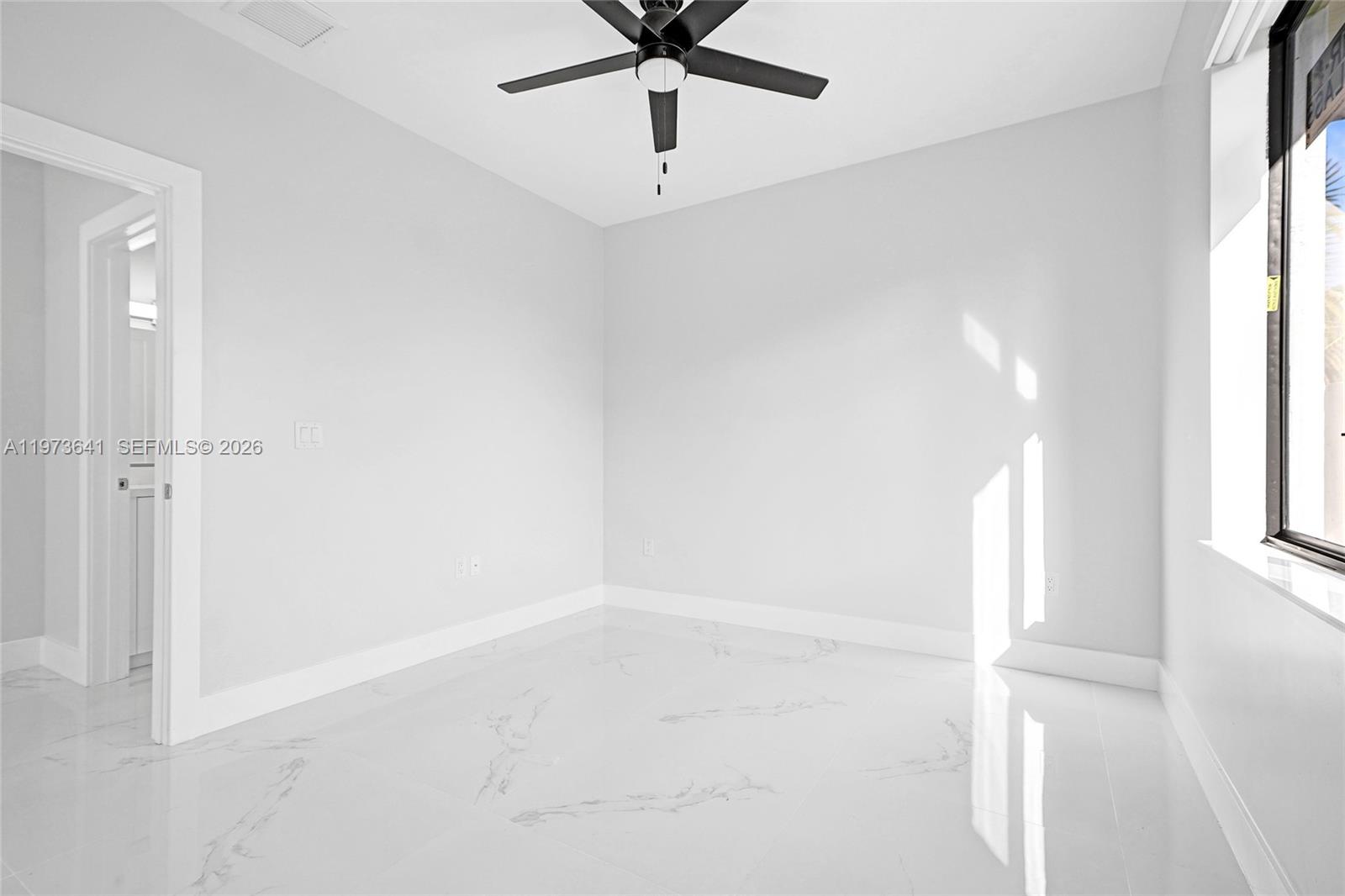 12120 Southwest 219th Street, Unit B Miami, FL 33170 - Photo 26 of 53 a view of empty room with window