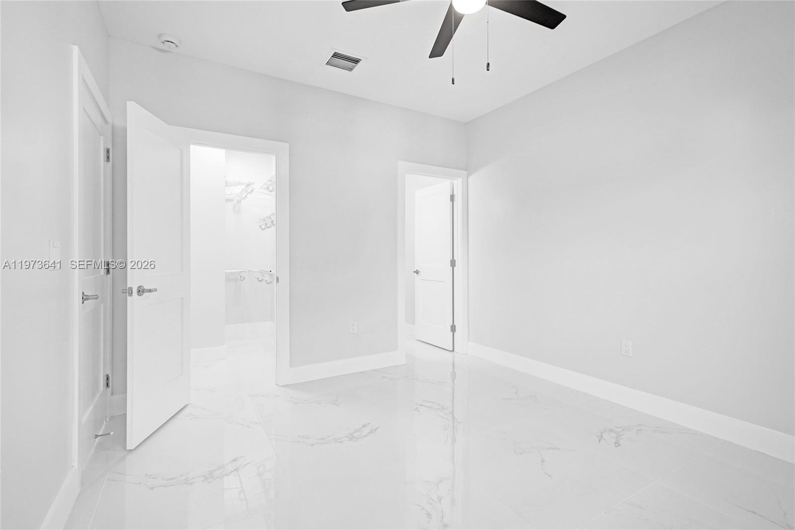 12120 Southwest 219th Street, Unit B Miami, FL 33170 - Photo 30 of 53 wooden floor in an empty room
