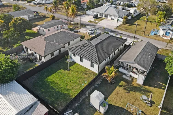 an aerial view of a house with a balcony