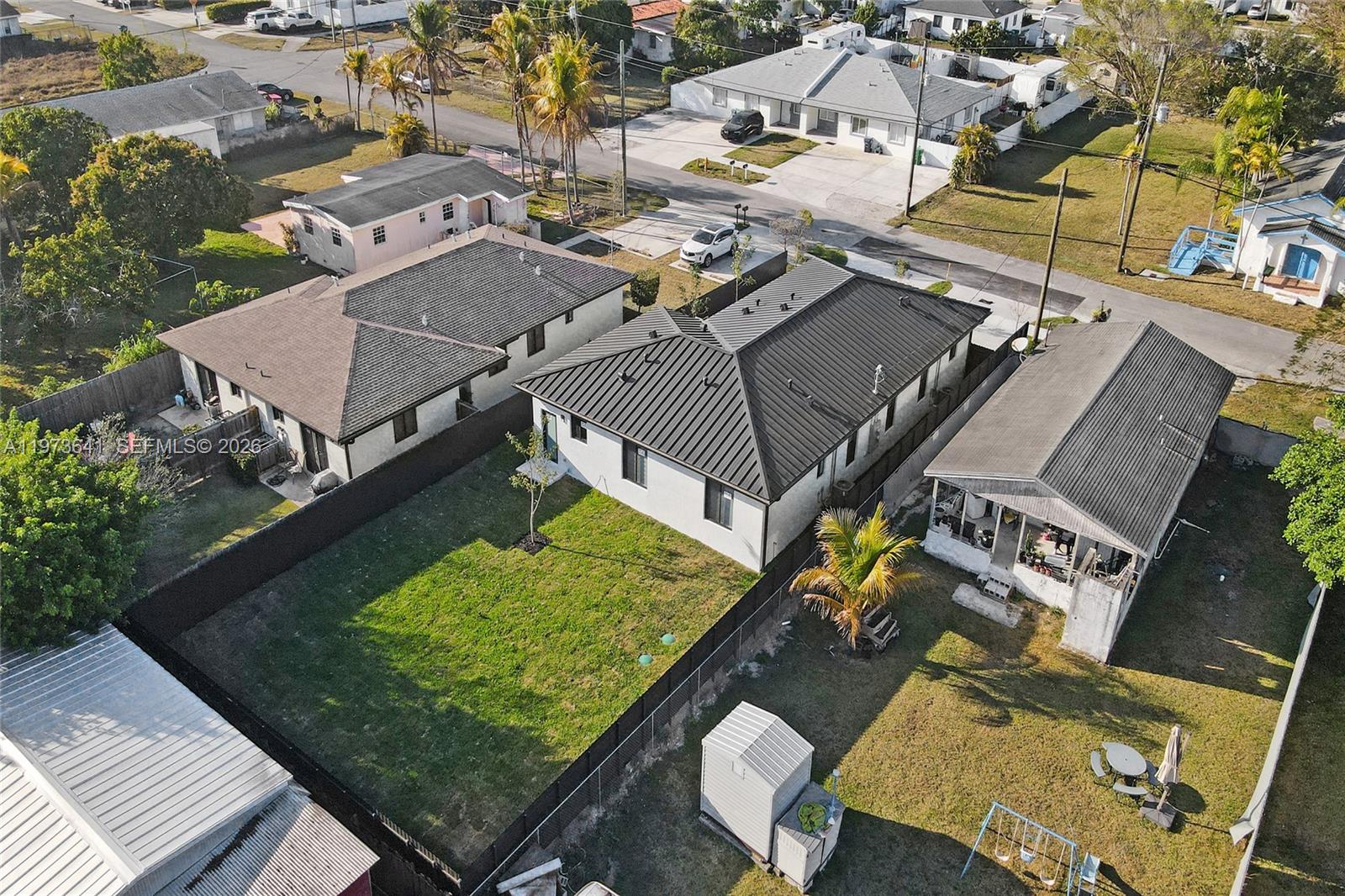 12120 Southwest 219th Street, Unit B Miami, FL 33170 - Photo 40 of 53 an aerial view of a house with a swimming pool