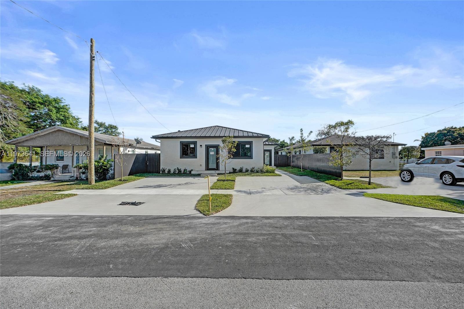 12120 Southwest 219th Street, Unit B Miami, FL 33170 - Photo 47 of 53 a childrens park with lots of swings and slides