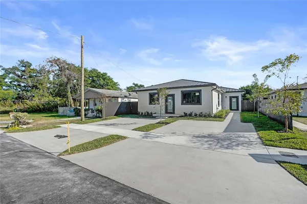 front view of house with a yard