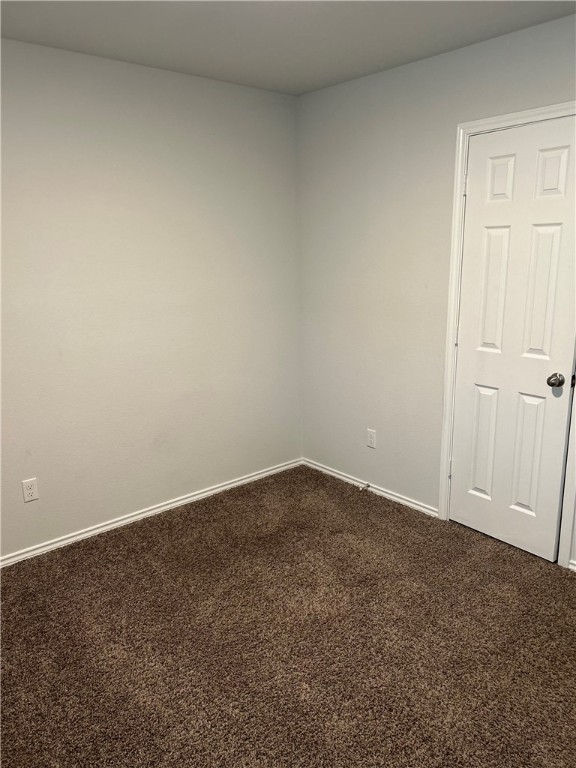 248 Poplin Lane Troy, TX 76579 - Photo 11 of 24 an empty room with a workbench