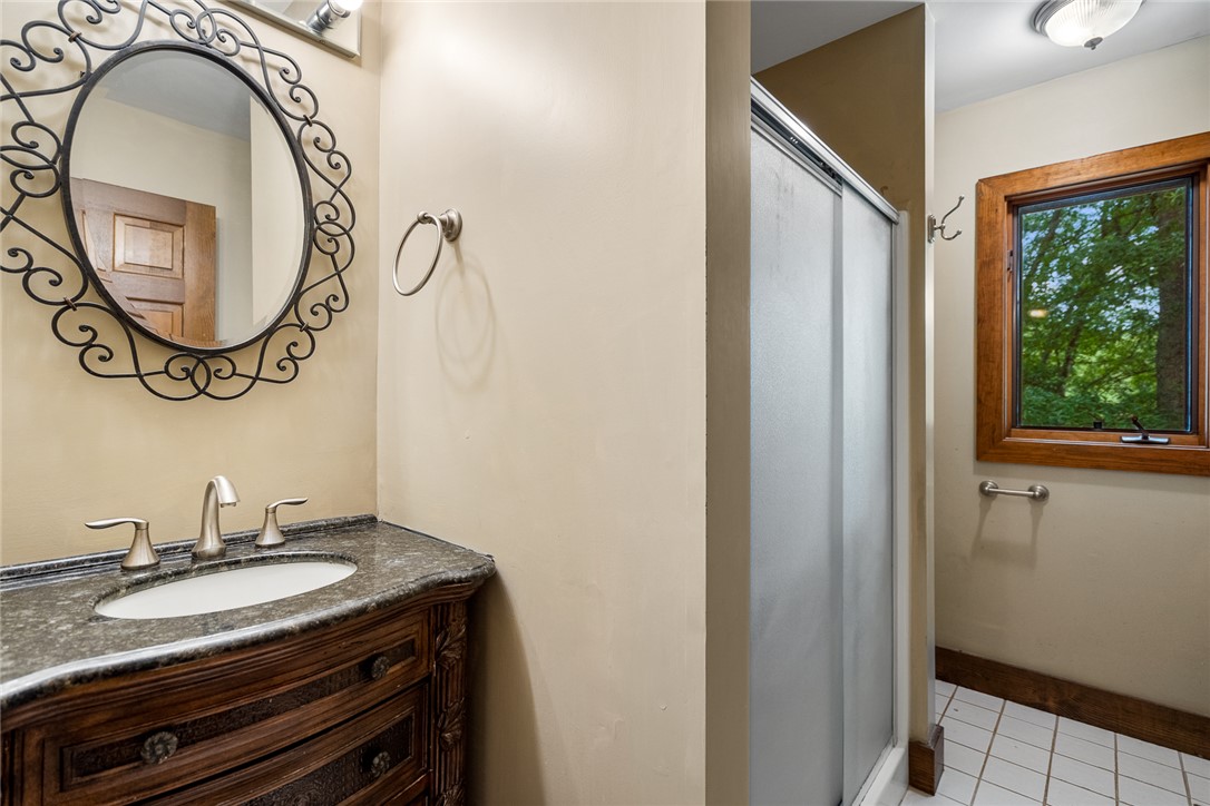 324 Hobson Road Anderson, SC 29621 - Photo 28 of 46 This bathroom features a sophisticated vanity with ample counter space and a convenient shower.