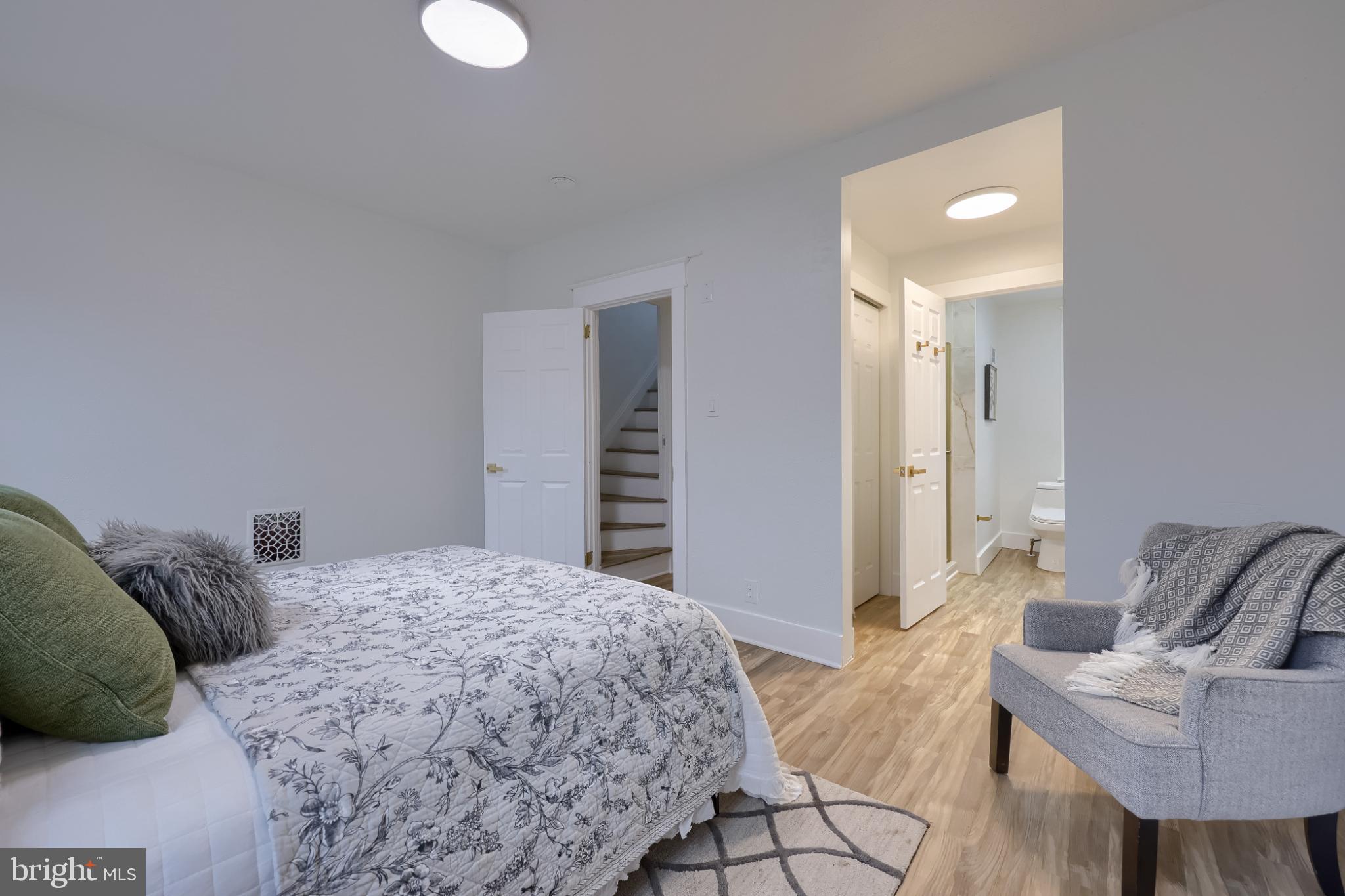 610 East Madison Street Lancaster, PA 17602 - Photo 18 of 68 a bedroom with a bed and a couch