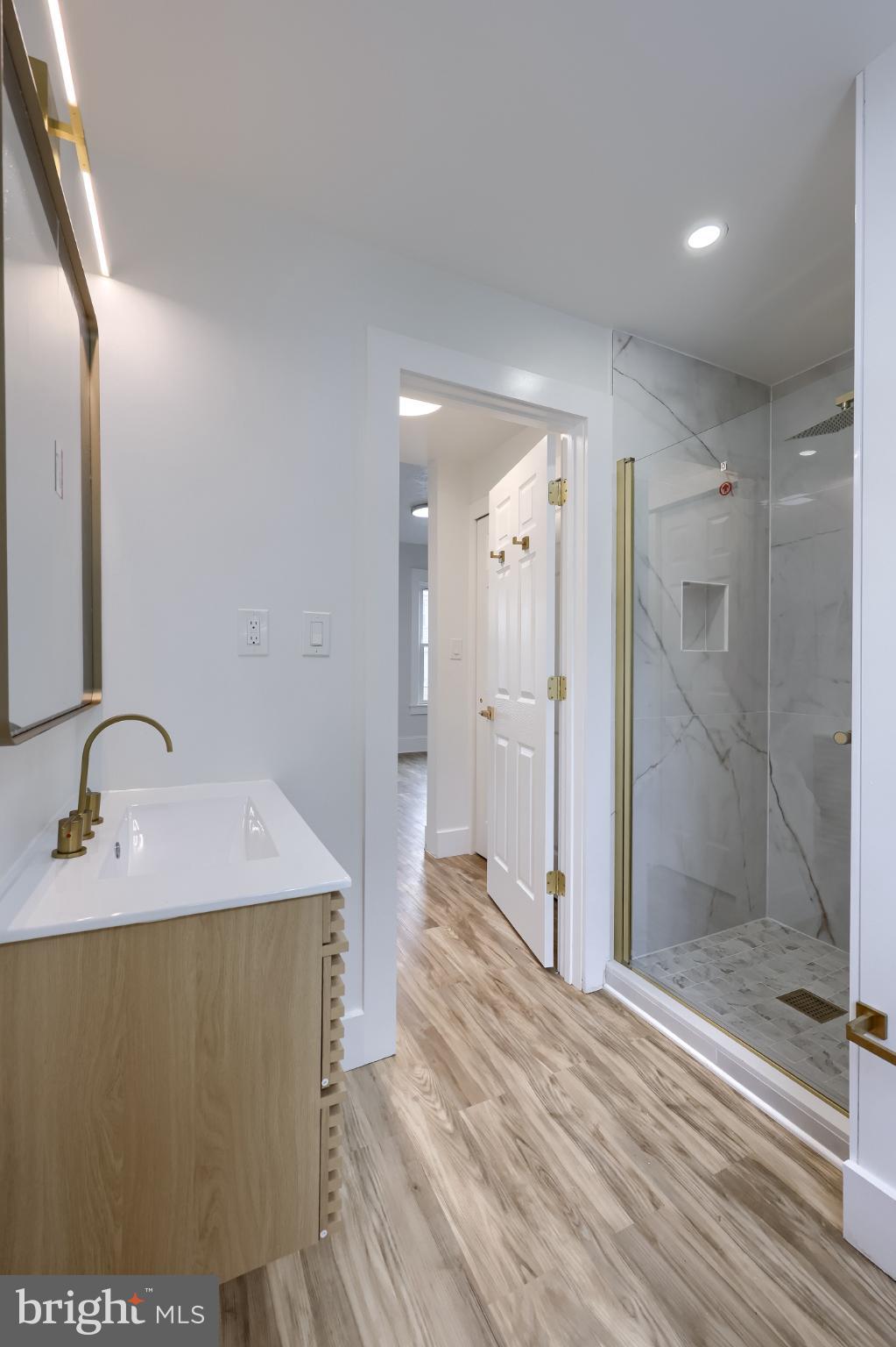 610 East Madison Street Lancaster, PA 17602 - Photo 26 of 68 a bathroom with a sink and a mirror