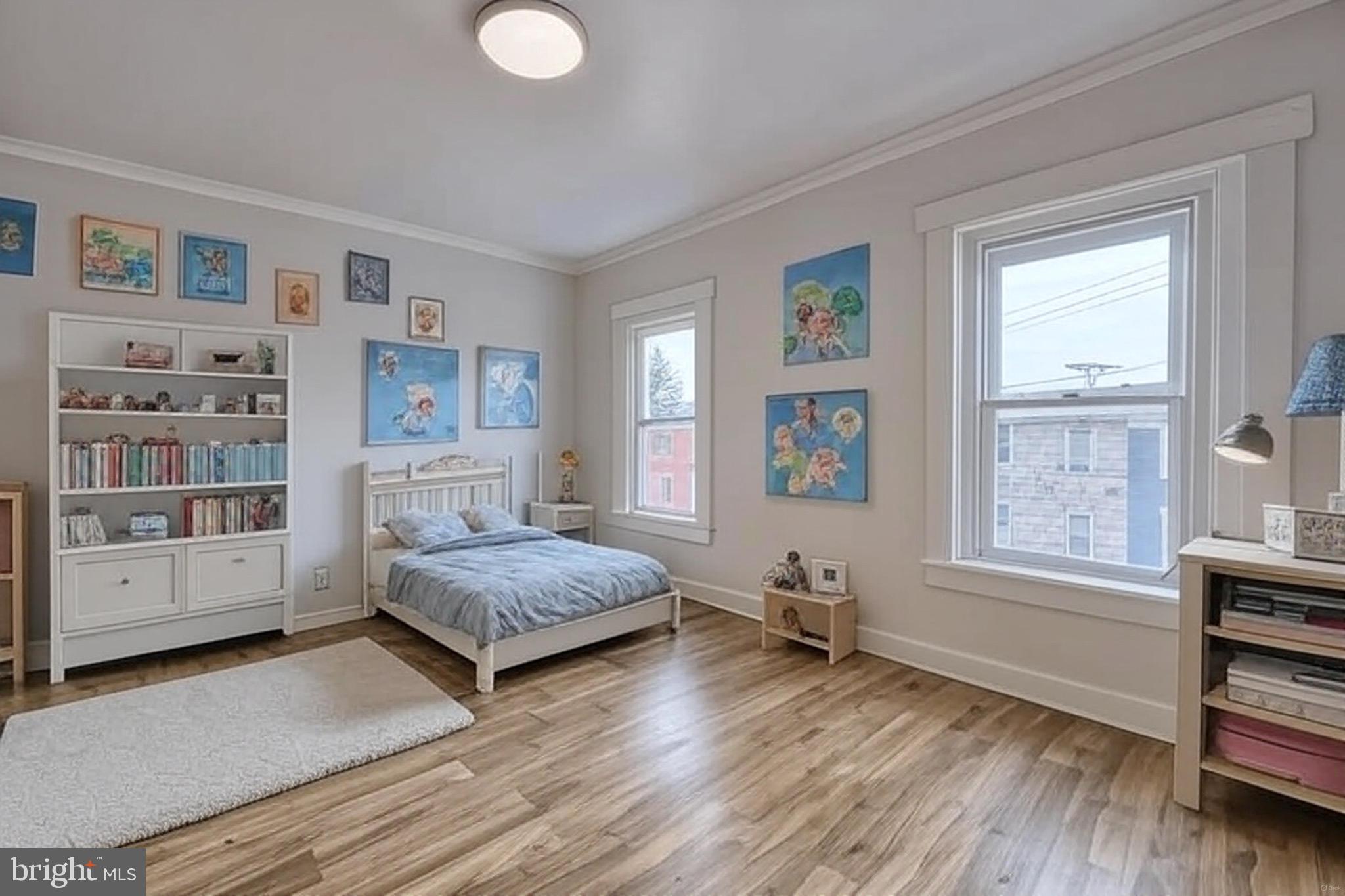 610 East Madison Street Lancaster, PA 17602 - Photo 27 of 68 a living room with furniture and a window