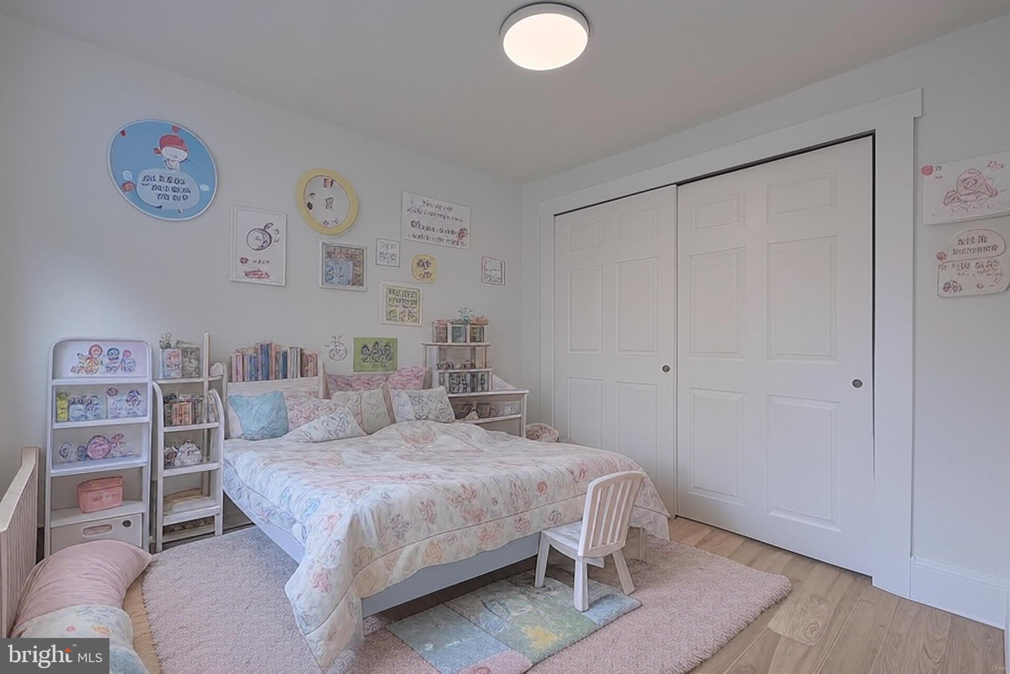 610 East Madison Street Lancaster, PA 17602 - Photo 29 of 68 a bedroom with a bed and a cabinets