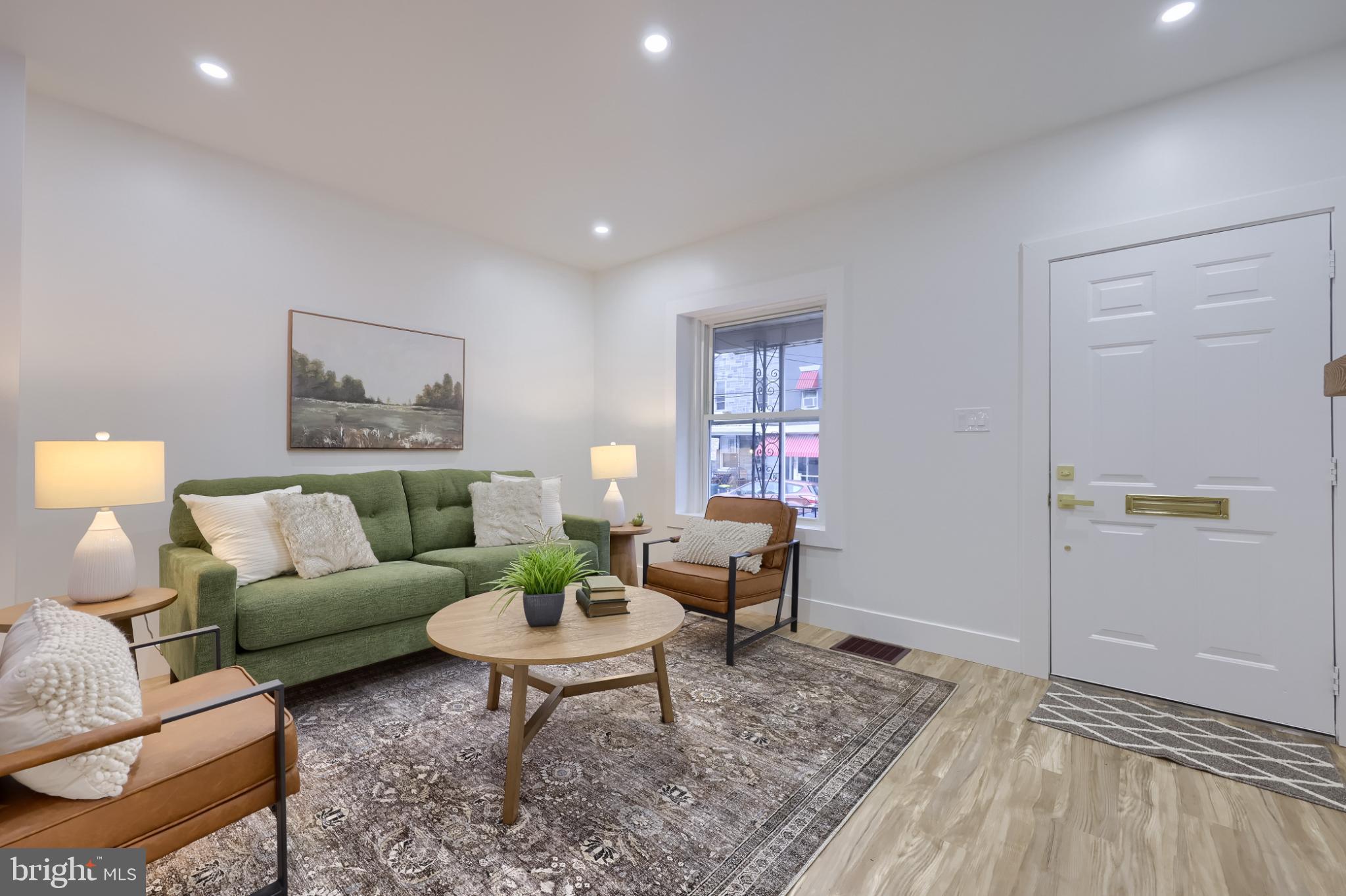 610 East Madison Street Lancaster, PA 17602 - Photo 4 of 68 a living room with furniture and a rug