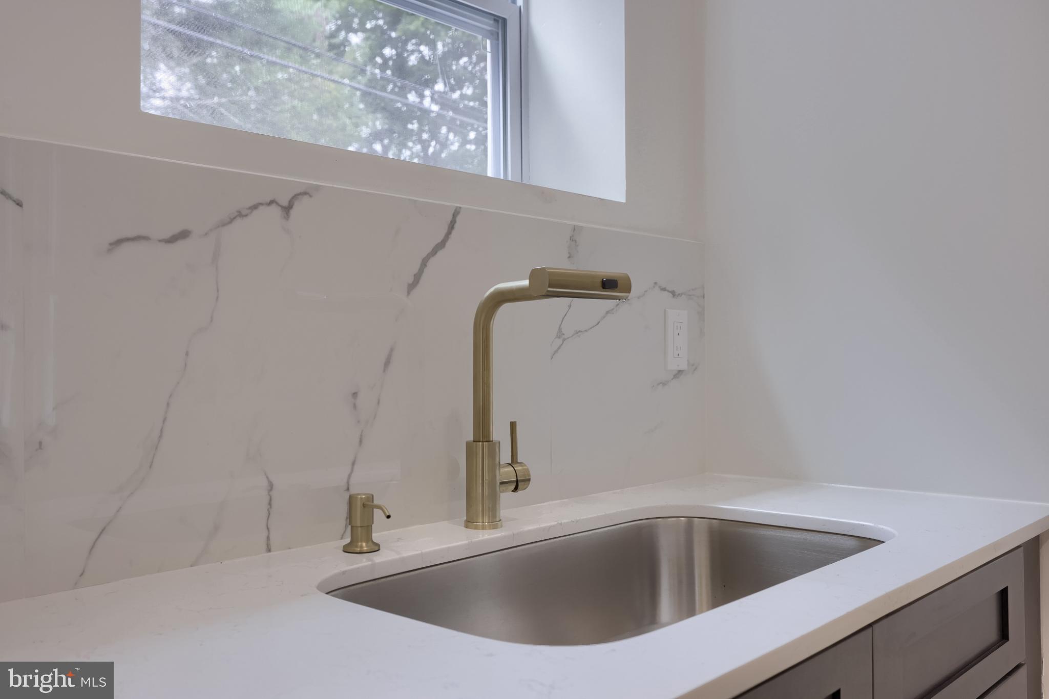 610 East Madison Street Lancaster, PA 17602 - Photo 41 of 68 a close view of a sink and tap