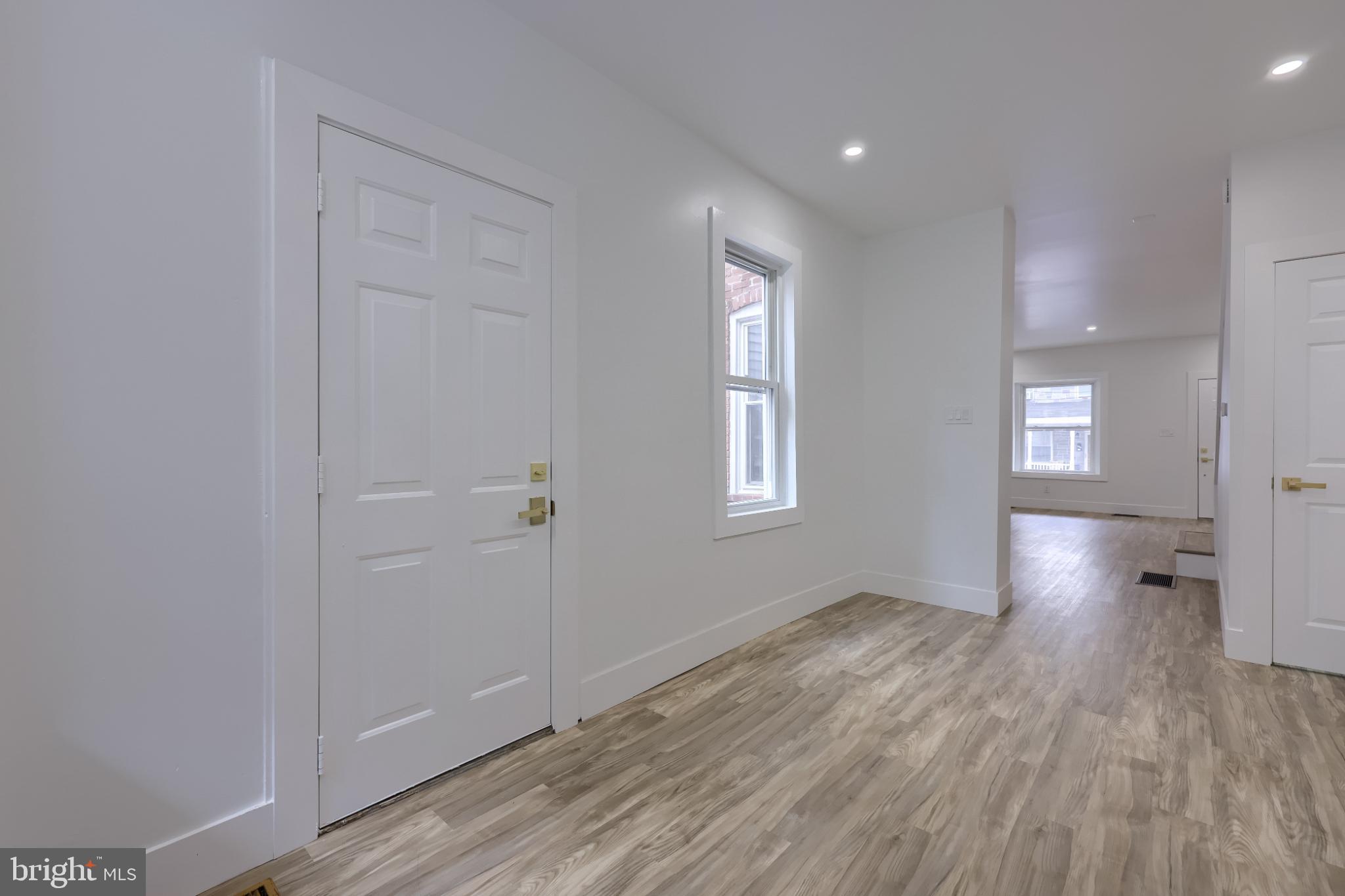 610 East Madison Street Lancaster, PA 17602 - Photo 44 of 68 a view of empty room with window and wooden floor