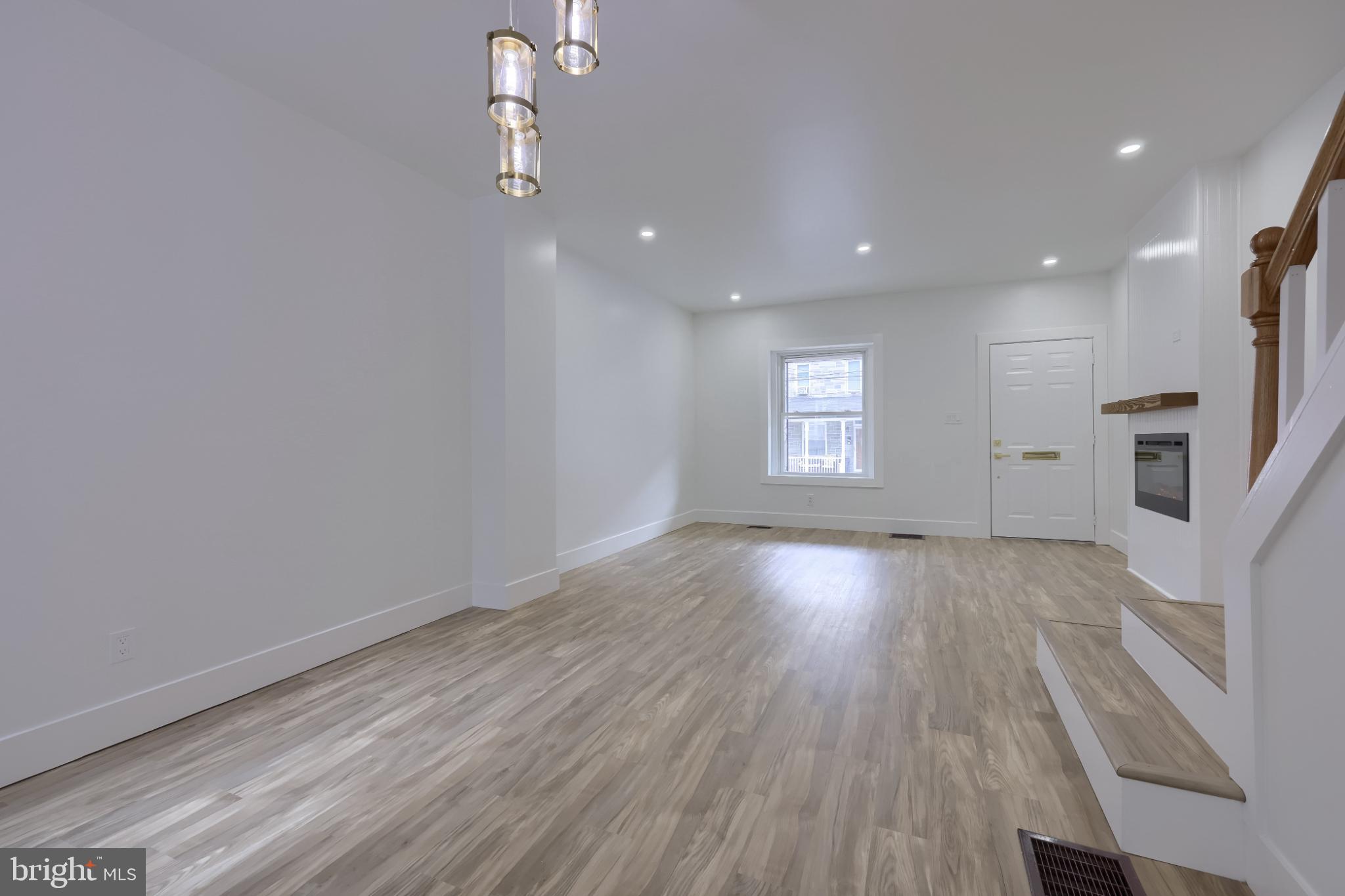 610 East Madison Street Lancaster, PA 17602 - Photo 53 of 68 wooden floor in an empty room with a window