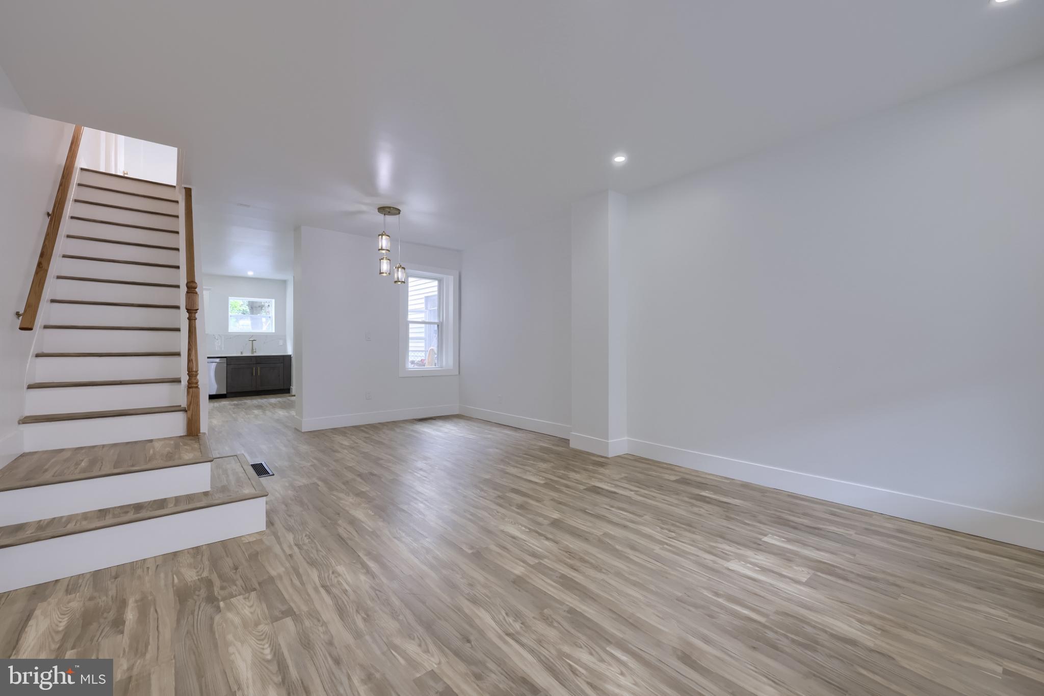 610 East Madison Street Lancaster, PA 17602 - Photo 55 of 68 wooden floor in an empty room with a window