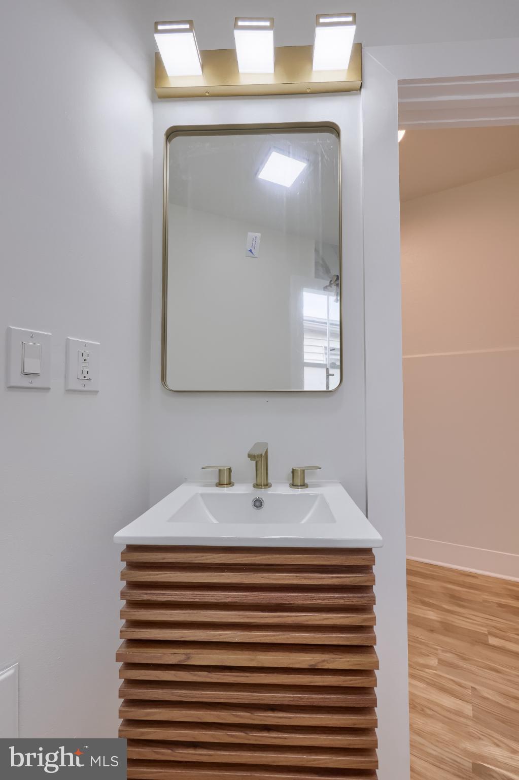 610 East Madison Street Lancaster, PA 17602 - Photo 57 of 68 a bathroom with a sink and a mirror