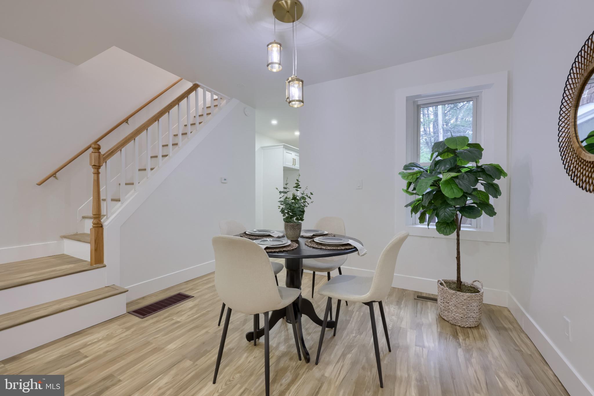 610 East Madison Street Lancaster, PA 17602 - Photo 7 of 68 a view of a dining room with furniture and wooden floor