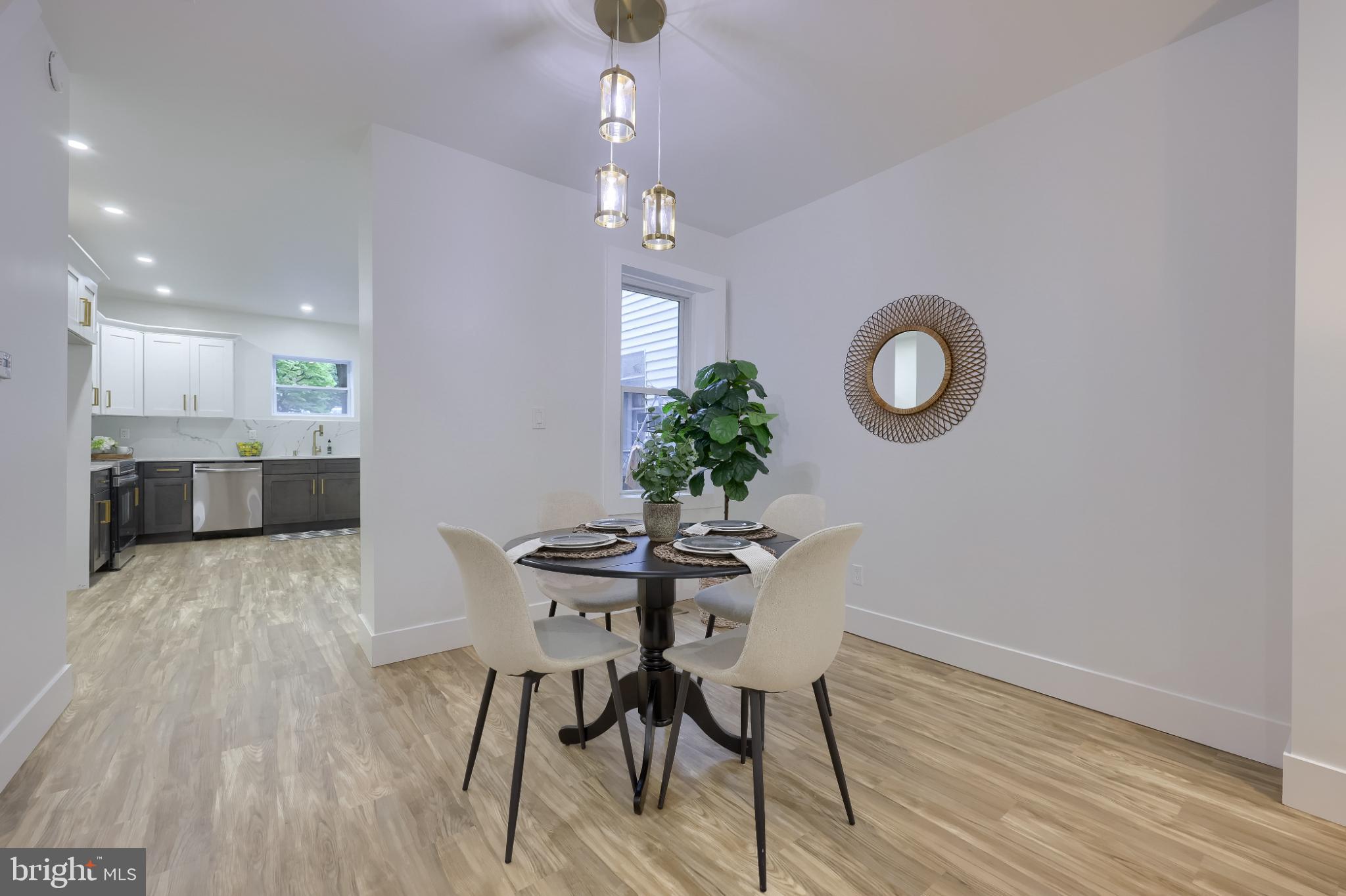 610 East Madison Street Lancaster, PA 17602 - Photo 8 of 68 a view of a dining room with furniture and wooden floor