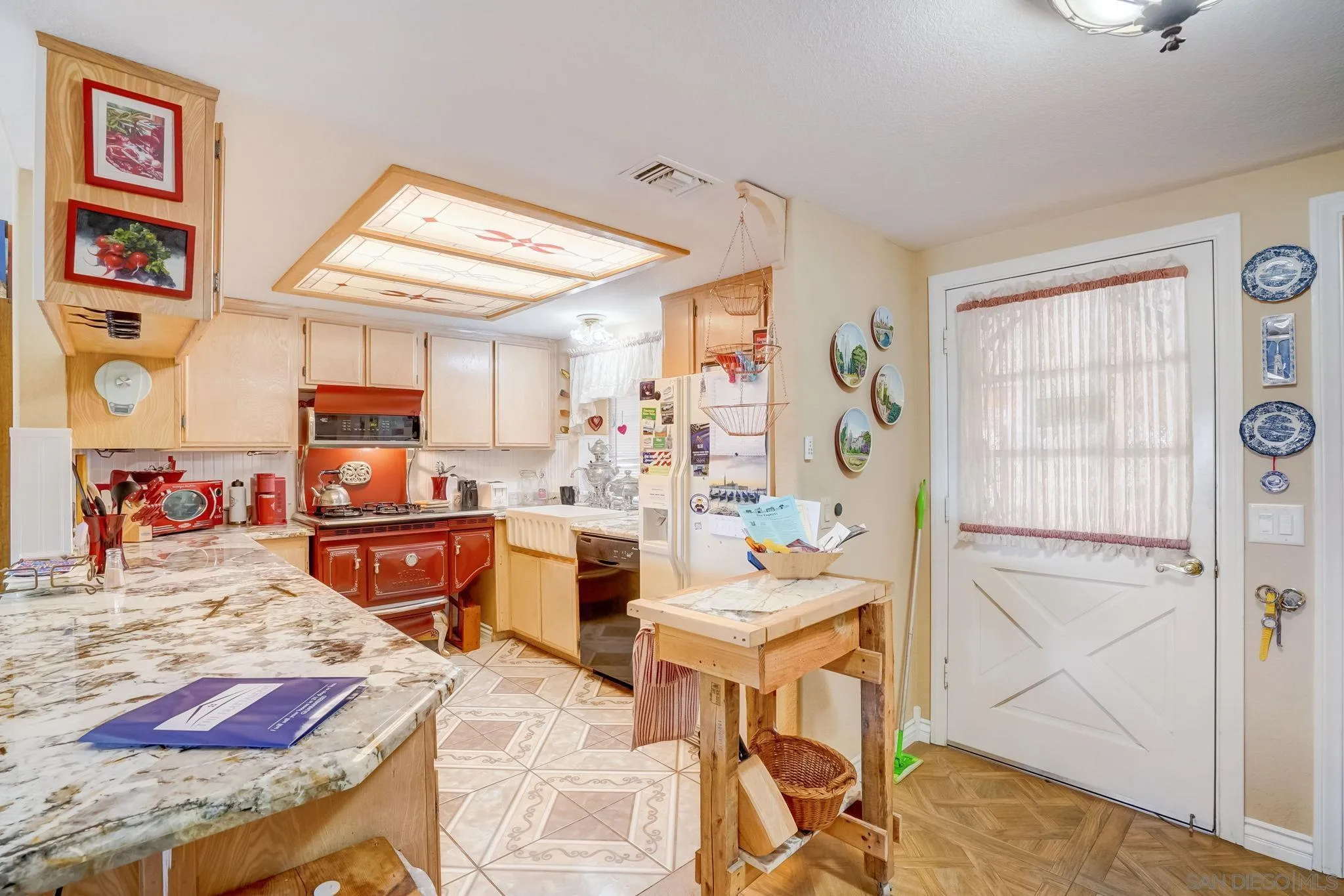 969 Ridge Heights Drive Fallbrook, CA 92028 - Photo 11 of 32 a bed room with a bed and a view of kitchen