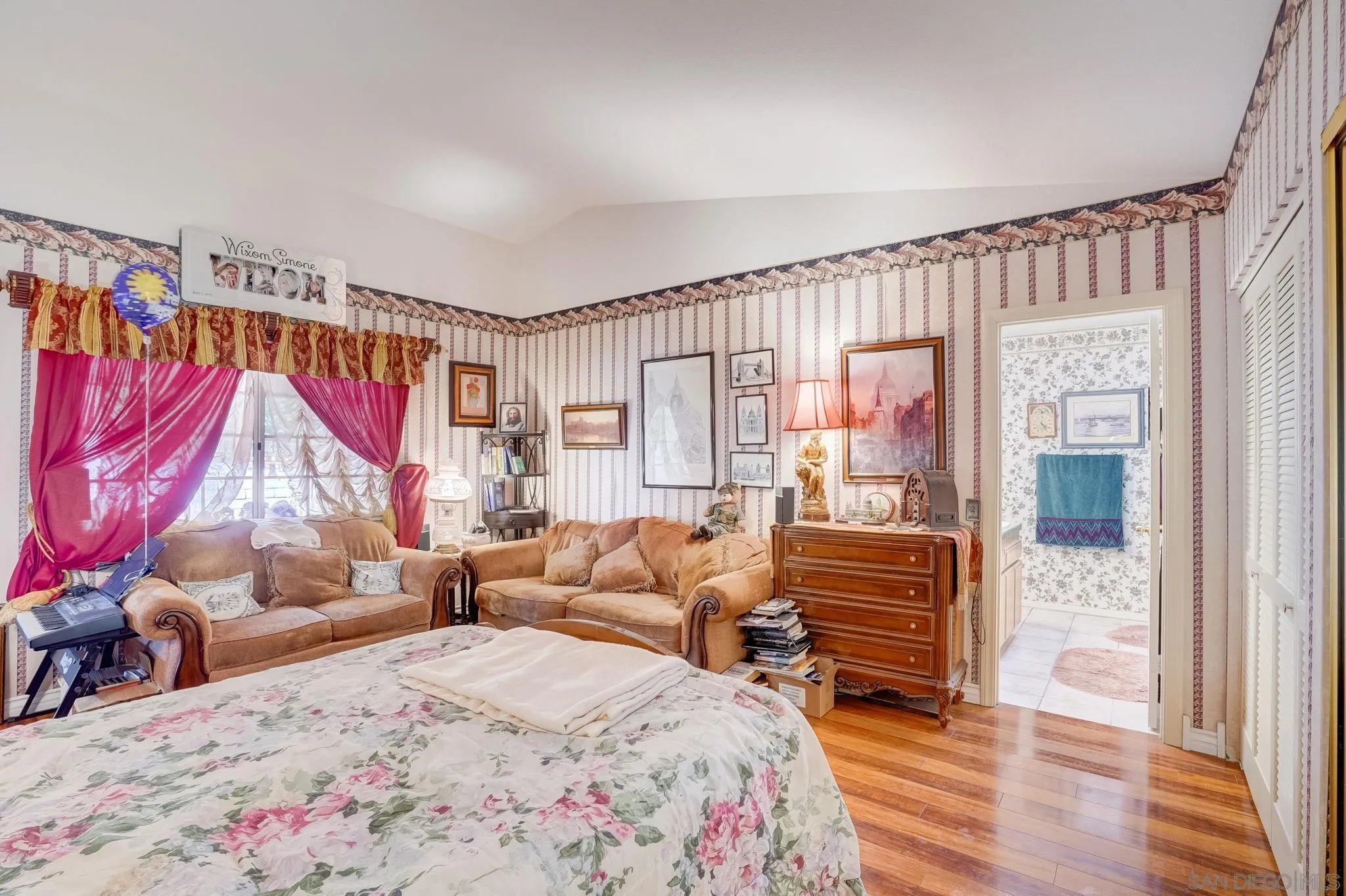 969 Ridge Heights Drive Fallbrook, CA 92028 - Photo 21 of 32 a bedroom with a bed and a couch