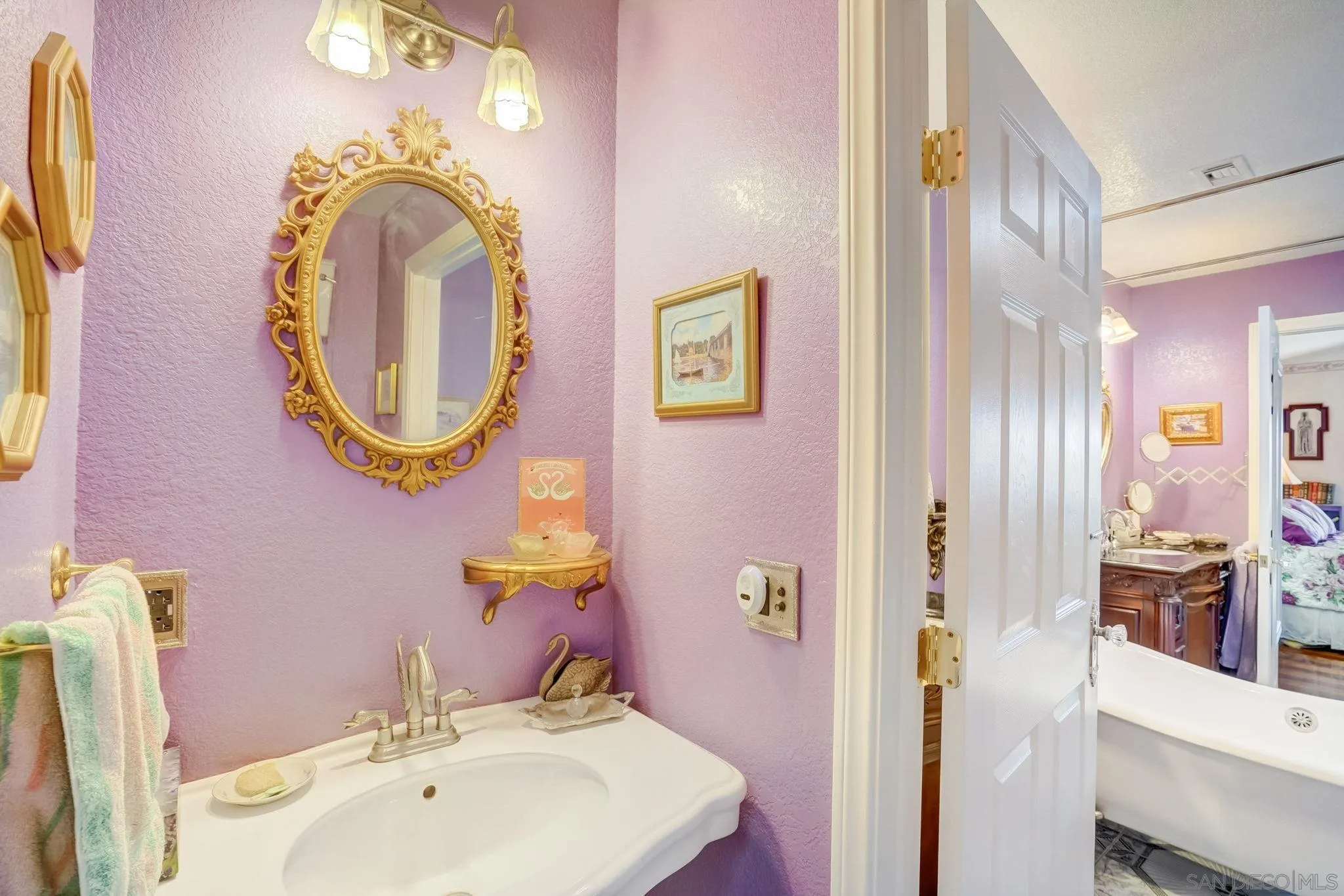 969 Ridge Heights Drive Fallbrook, CA 92028 - Photo 23 of 32 a bathroom with a sink and a mirror