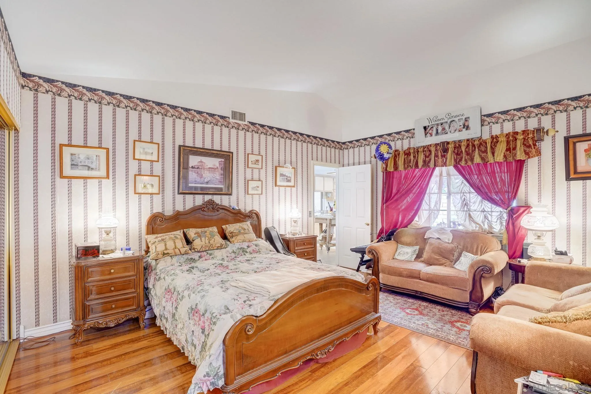 969 Ridge Heights Drive Fallbrook, CA 92028 - Photo 25 of 32 a bedroom with a bed and a couch