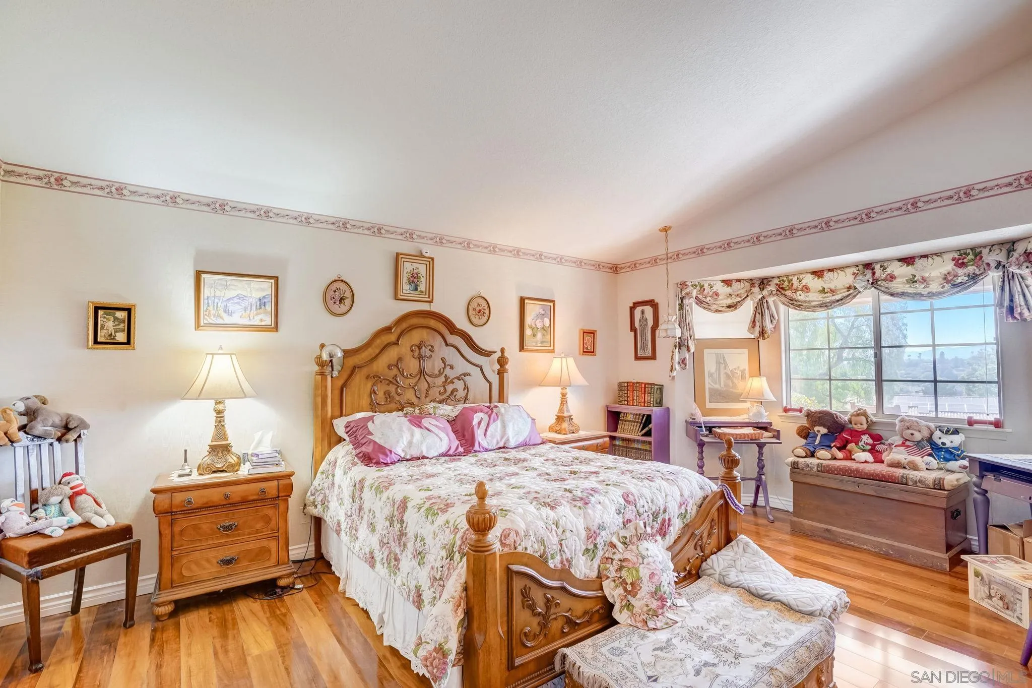 969 Ridge Heights Drive Fallbrook, CA 92028 - Photo 9 of 32 a bedroom with a bed and wooden floor