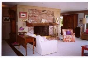 Undisclosed Address Chatham, MA 02633 - Photo 3 of 6 a view of a dining room with furniture and a fireplace
