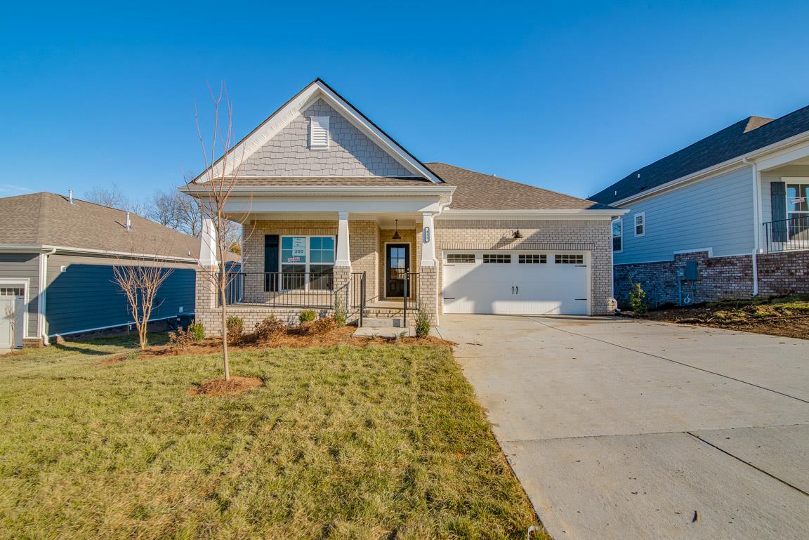 411 Butler Road Mount Juliet, TN 37122 - Photo 1 of 30 a front view of a house with a yard and garage