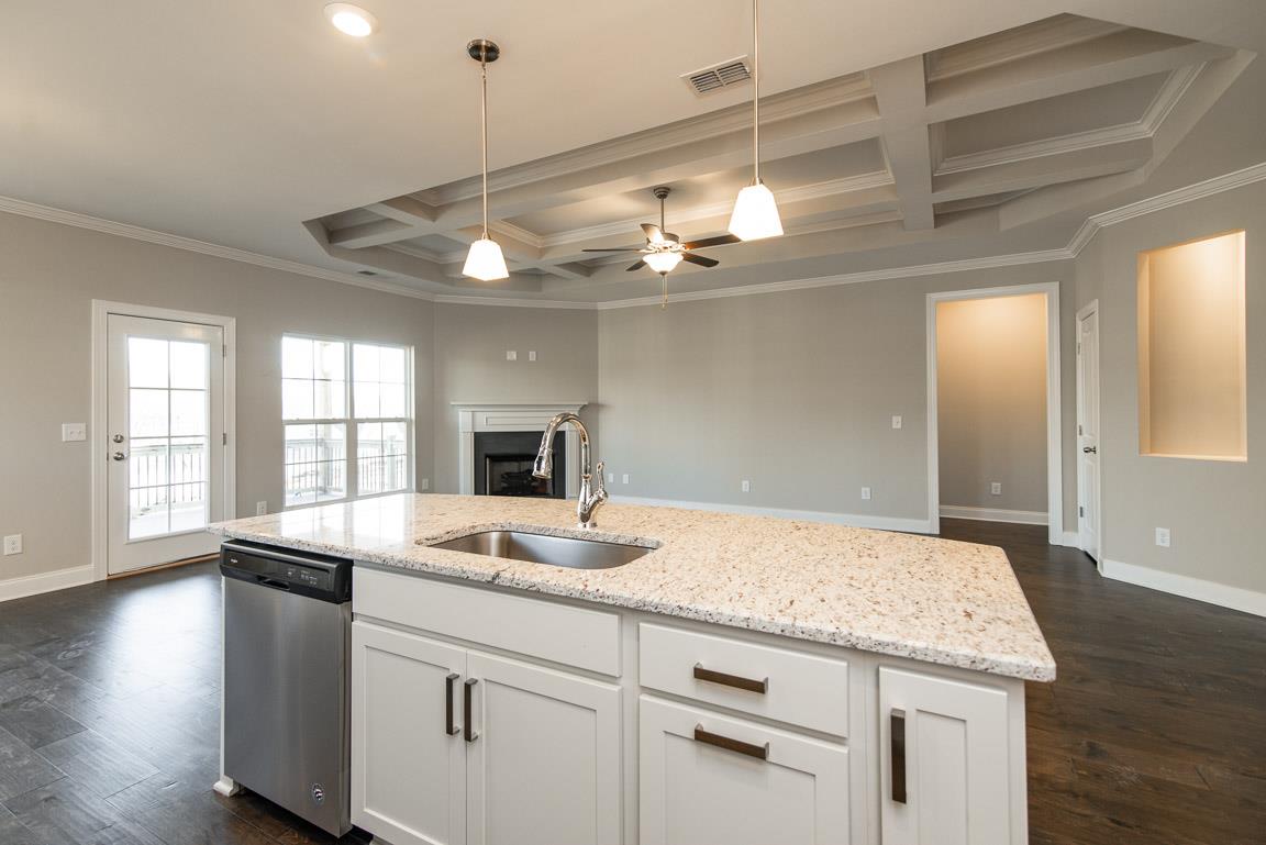 411 Butler Road Mount Juliet, TN 37122 - Photo 11 of 30 a open kitchen with a sink and chandelier