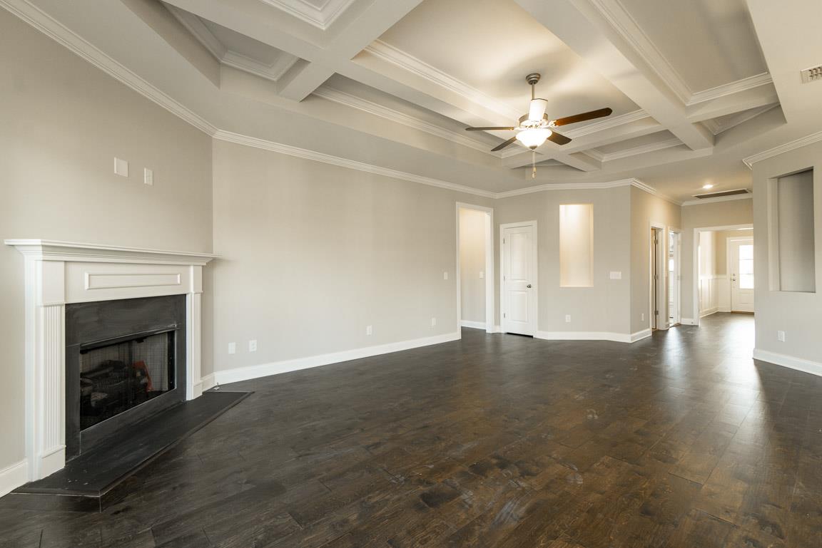 411 Butler Road Mount Juliet, TN 37122 - Photo 12 of 30 an empty room with windows and a fireplace