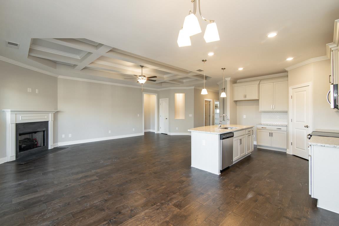 411 Butler Road Mount Juliet, TN 37122 - Photo 13 of 30 a large white kitchen with a large window a stove and a refrigerator