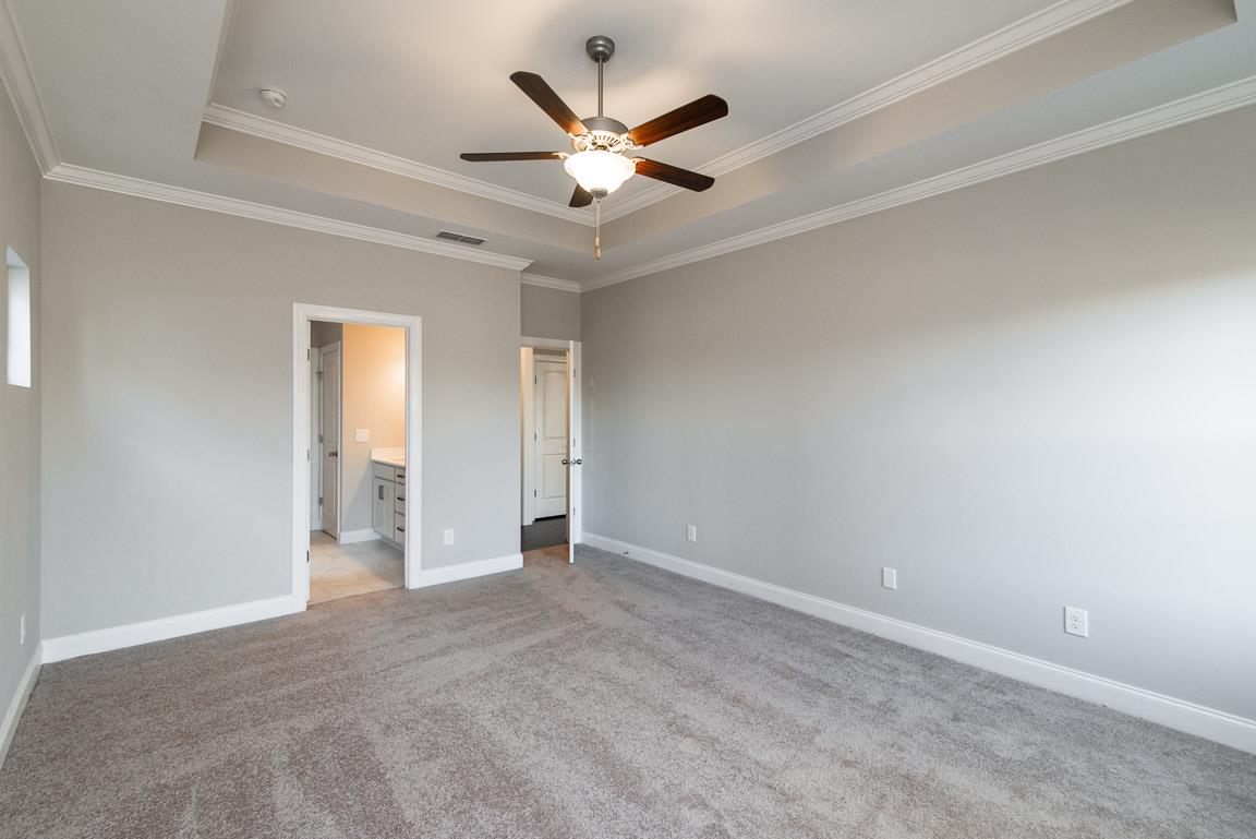 411 Butler Road Mount Juliet, TN 37122 - Photo 16 of 30 an empty room with closet and ceiling fan