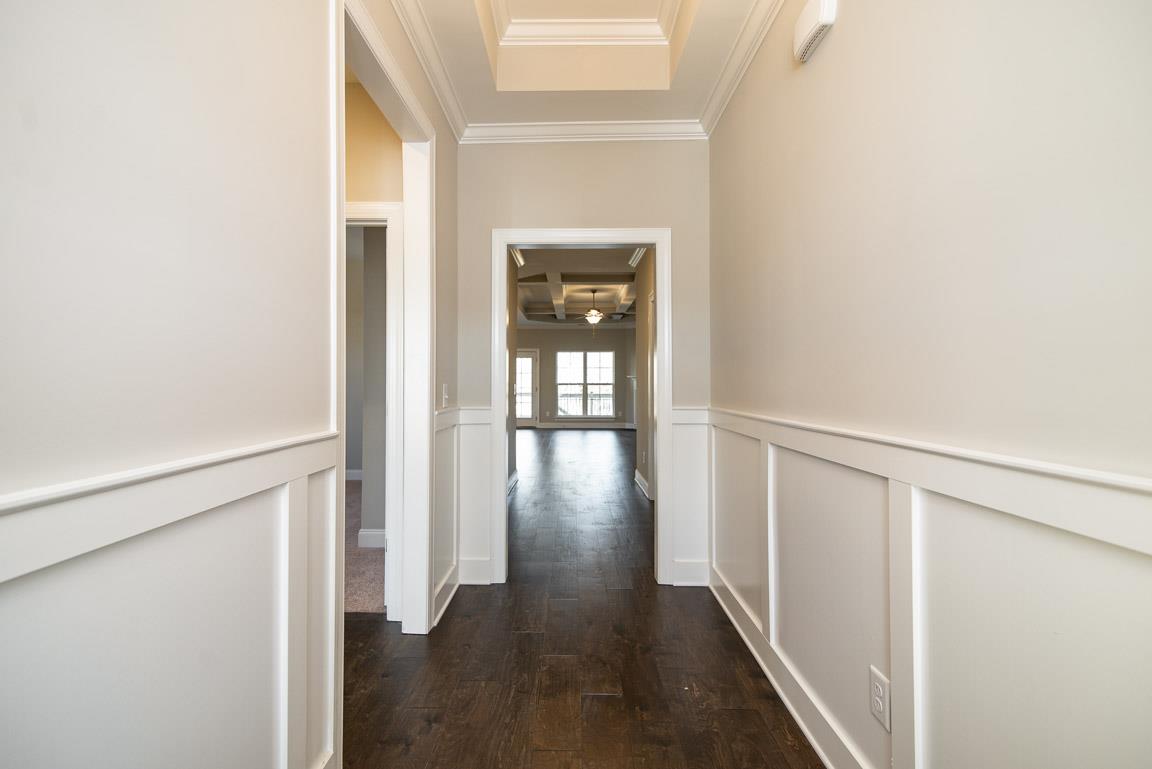 411 Butler Road Mount Juliet, TN 37122 - Photo 30 of 30 a view of a hallway with wooden floor and stairs